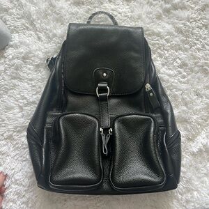 Black Leather Backpack with Flap Closure and Sturdy Handle